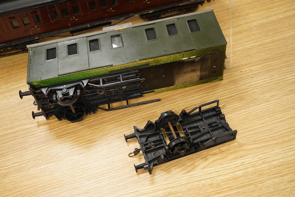 Two Gauge One bogie coaches; a Midland Railway clerestory coach, together with a 12-wheel Pullman car (bogies af), plus an American outline caboose, some scratch building and adaptation from kits, etc.